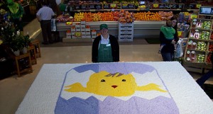 A giant cake at Sobeys decorated with the paper egg logo