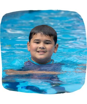 Image of George in a pool