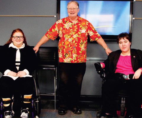 Paul with two Easter Seals kids.