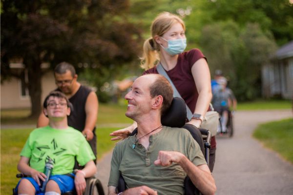 Cody at Camp in a wheelchair thumbnail image