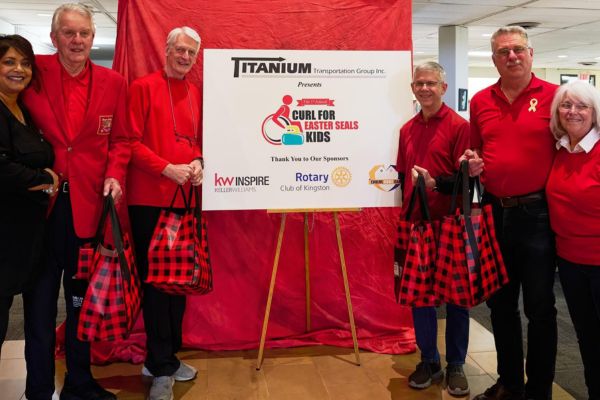 Curl for Easter Seals Kids - organizers line up for a picture