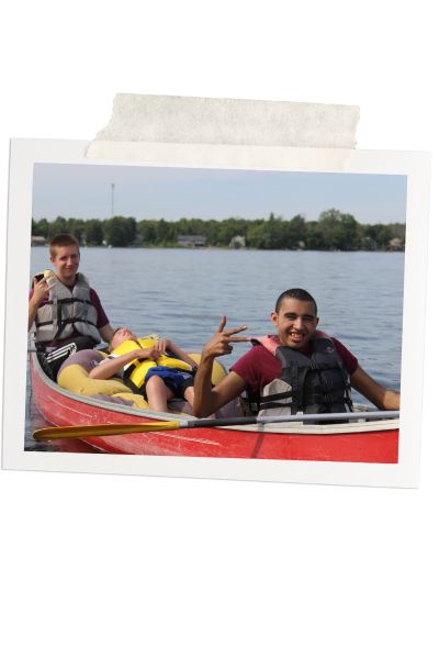 Image of Jake at camp canoeing 