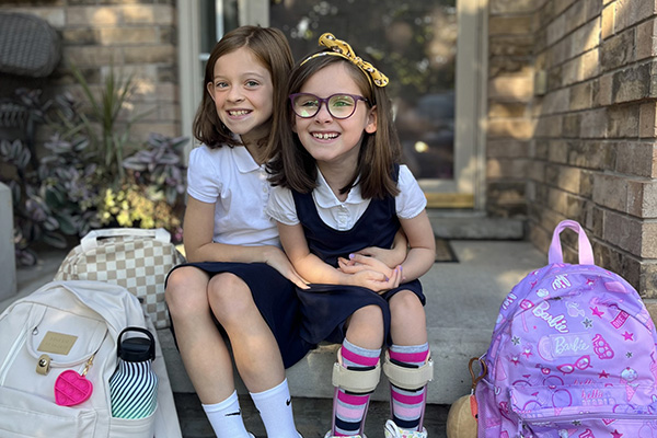 Everly on the steps before school.