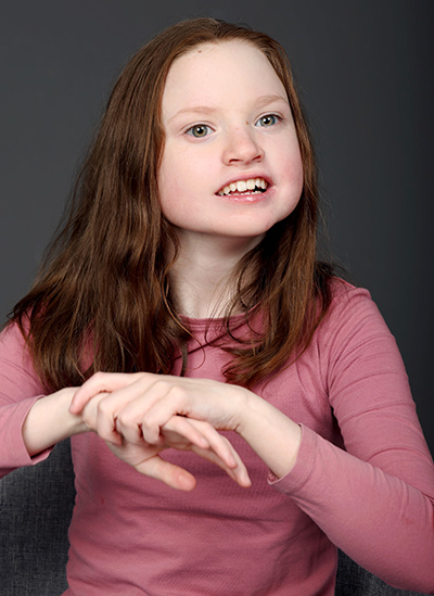 Rilynn in a pink shirt.